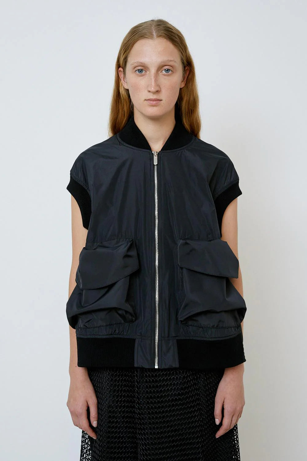 Sleeveless Jacket with bronze front zip