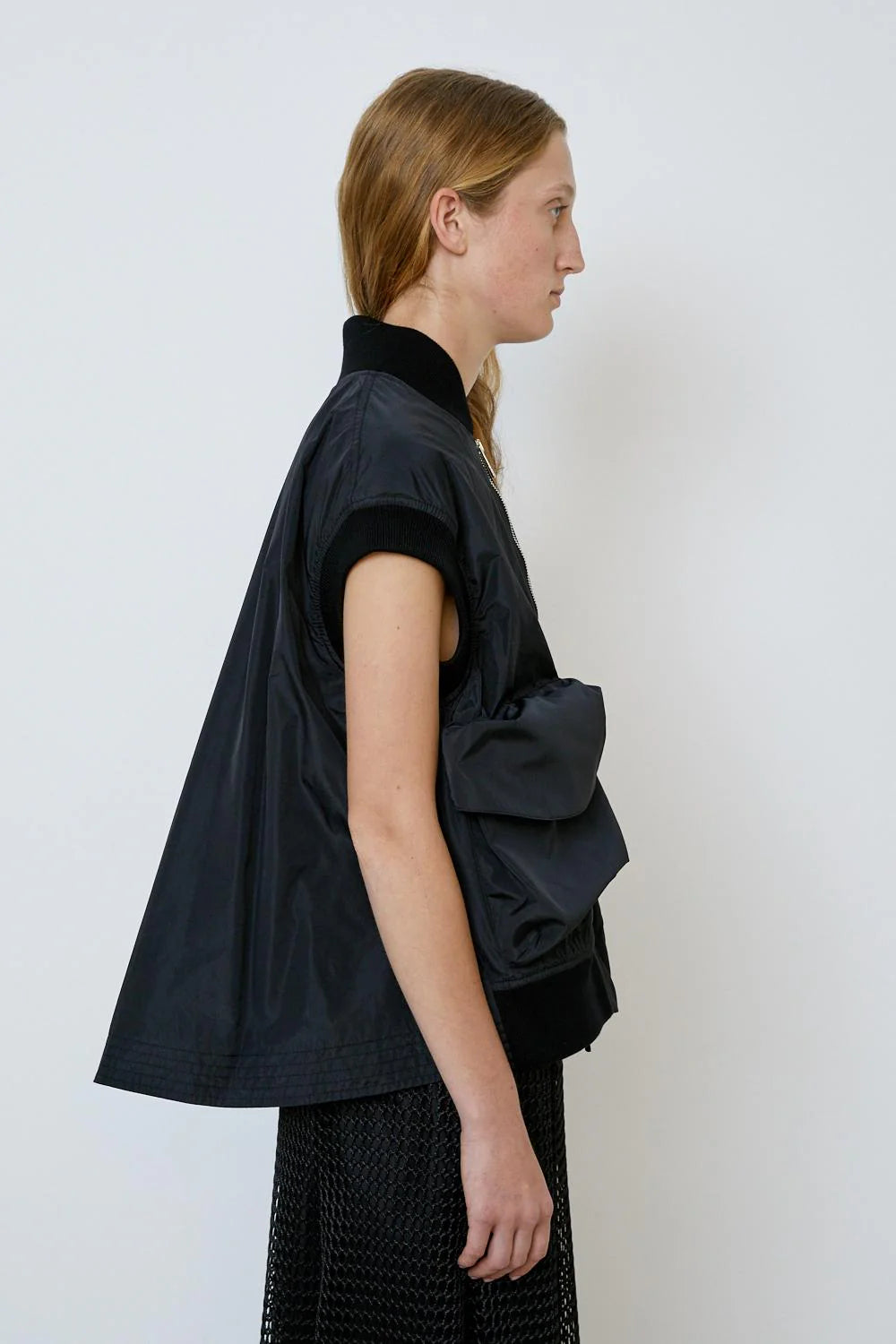 Sleeveless Jacket with bronze front zip