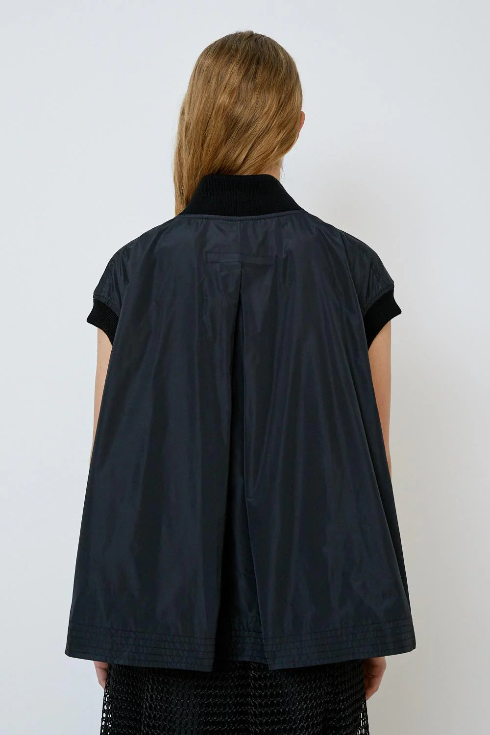 Sleeveless Jacket with bronze front zip