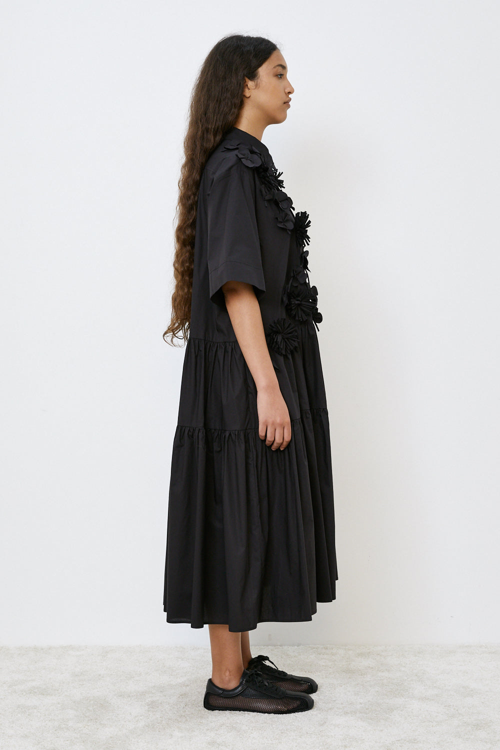 100% Cotton Dress with detailed ruffles and bows on front in Black