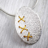 Sewn Silver Oval Cross Stitch Necklace with Gold thread